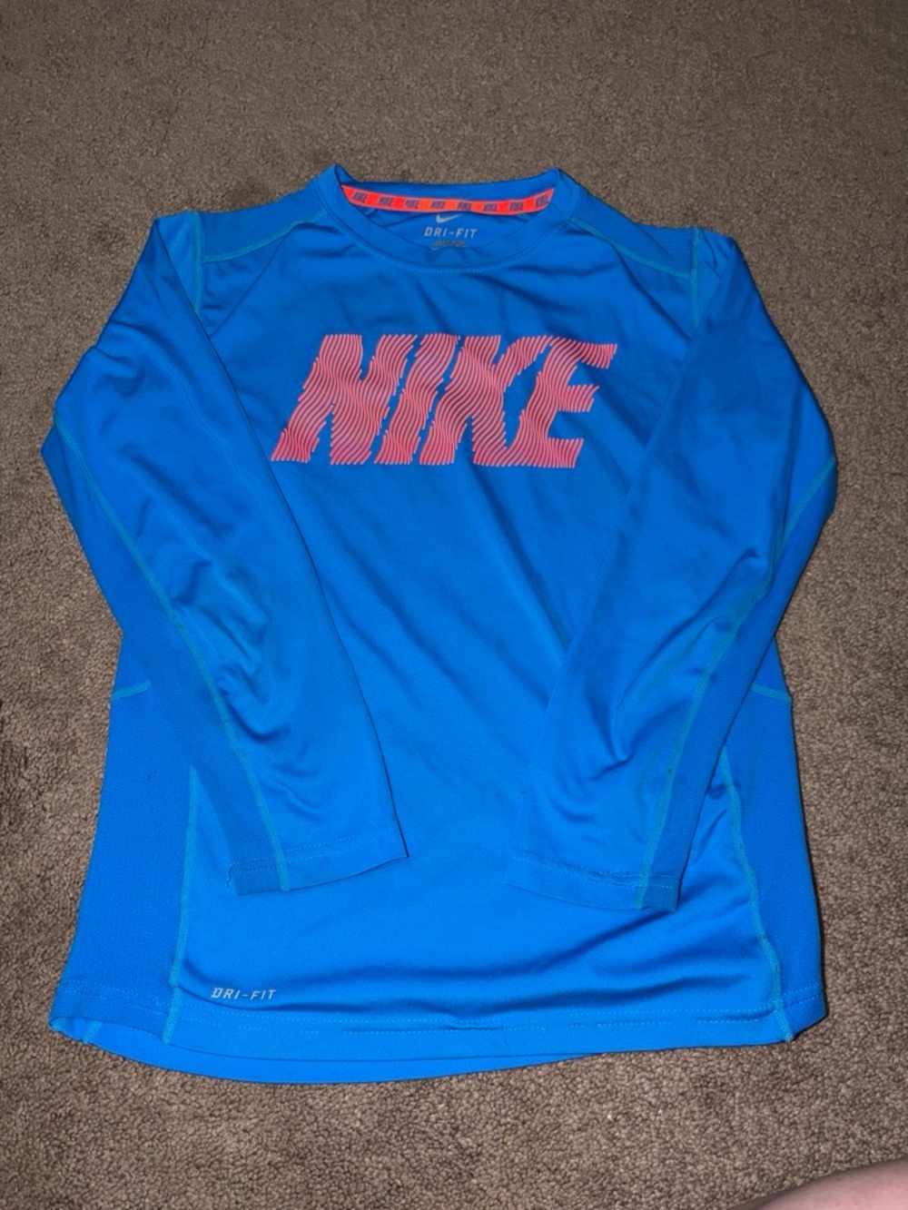 Nike Blue Long Sleeve Dri-FIT Top with Pink Logo